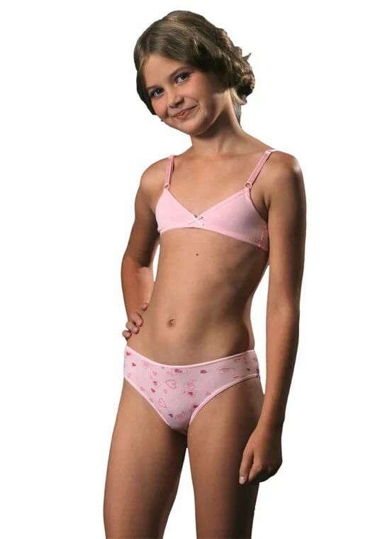 small-chested girl in pink bra and panties 553x760
