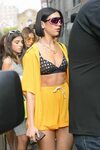 Dua Lipa Wears a bra top under a yellow outfit in New York C