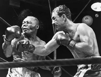 Rocky Marciano Landing A Punch by Everett Boxing history, Bo