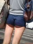 Little Ass in Mini Shorts and Thin Legs - Girl on the Crossw