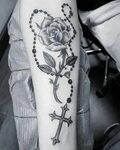 Nice black and grey rosary and rose tattoo by @jimmytattoo66