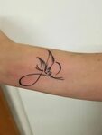 Infinity tattoo with butterfly #Foottattoos Side wrist tatto