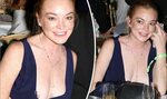 Lindsay Lohan suffers embarrassing nip-slip after THAT beach