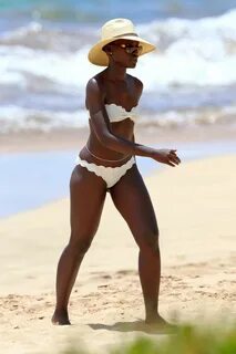 LUPITA NYONG’O in Bikini at a Beach i Haeaii - HawtCelebs