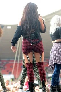 Jesy Nelson wears racy skintight trousers as she performs wi