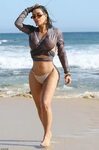 Kim Kardashian Shows off Her Body in Bikini Bottoms - Yve-St