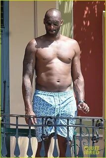 Kobe Bryant Hangs Shirtless By the Pool During Family Vacati