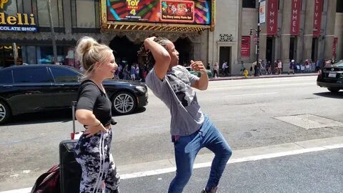 Fik-Shun & girlfriend Cassidy Payne dancing on Hollywood Blv