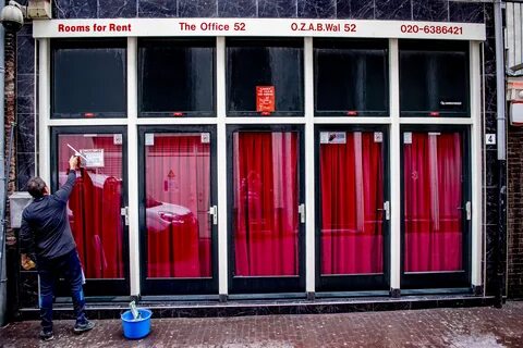 Kissing banned as Amsterdam's famous red light district reop