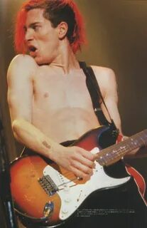 John Frusciante performing with the Red Hot Chili Peppers in