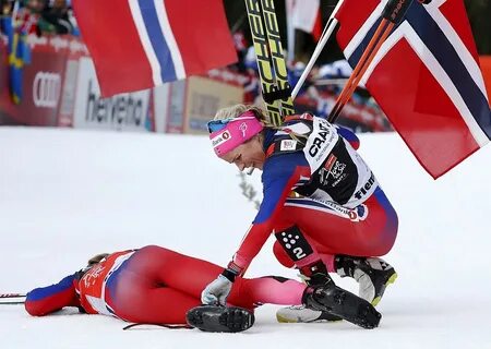 FIS Tour de Ski overall women winner Johaug helps her compat