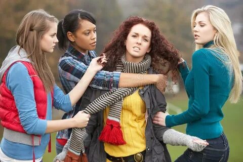 Group of Female Teenagers Bullying Girl Stock Photo - Image 