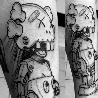 This tattoo is based on a sketch by Sorayama with a Kaws col