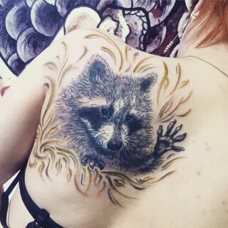 Raccoon tattoo: meaning, photon on the arm and sketches for 