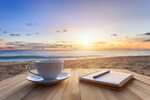 Coffee Cup On Wood Table At Sunset Or Sunrise Beach - Shari 