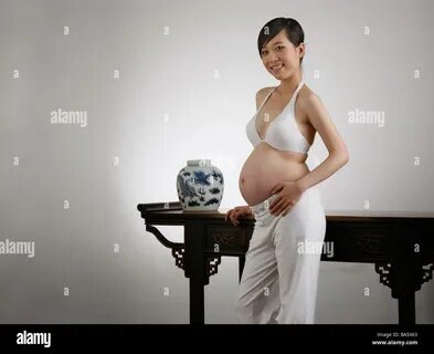 stock image: Chinese pregnant woman,China - BA5X63 from Alamy's librar...