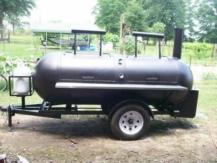 Hubby's grill( smoker) he made from 500 gallon propane tank!