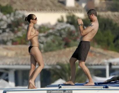 Rebecca Gayheart topless on a yacht paparazzi photos.