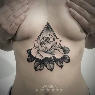 Triangle under boob tattoo