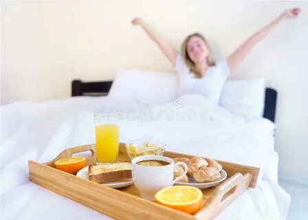 Woman Eating Breakfast in Bed Stock Photo - Image of juice, 