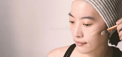 Asian Woman Beautiful Face Make Up by Foundation Liquid Stock Photo - Image of a