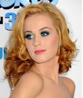 Katy Perry with strawberry blond hair & green blue eye makeu