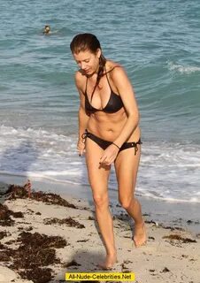 Kate Walsh hard nips in black bikini