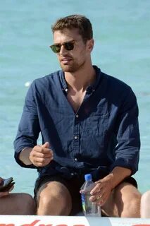 Question: Why Is Theo James Wearing a Shirt in These Photos?