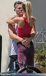 Sweaty Josh Brolin kisses wife Kathryn Boyd outside gym Dail