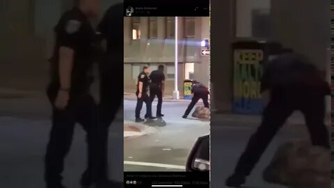 A woman in Baltimore just punched a cop in the face and was 