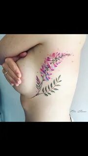 Birdcage tattoo on boob