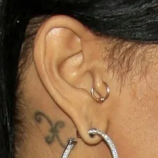 Rihanna's Piercings & Jewelry Steal Her Style