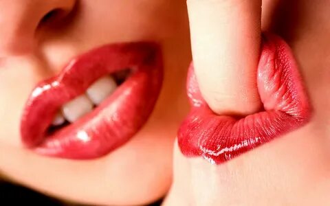 Pretty pictures: Lips and finger. - an exclusive wallpaper c