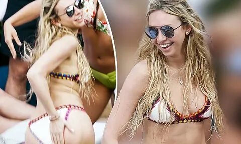 The Bachelor's Corinne Olympios flashes derriere in Miami Da