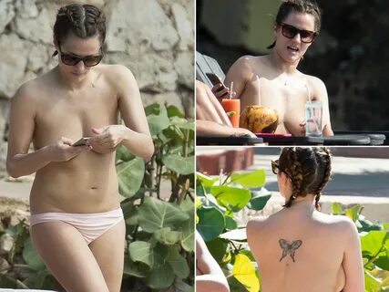Caroline Flack Goes Topless In Striped Bikini Bottoms