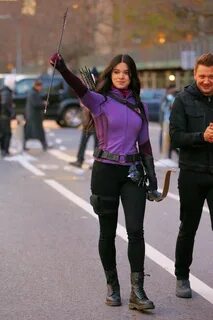 Actress Hailee Steinfeld and Jeremy Jeremy carry bows and ar