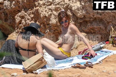 Emma Watson Displays Her Nude Tits on the Beach in Ibiza (77