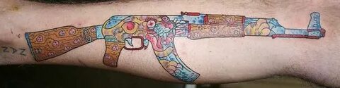 Gun Tattoo Images & Designs