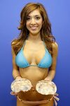 Farrah Abraham showing off her boob implants in a beach phot