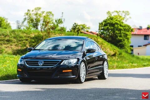 Elegant Black Volkswagen with the New Hood and Wheels - CARi