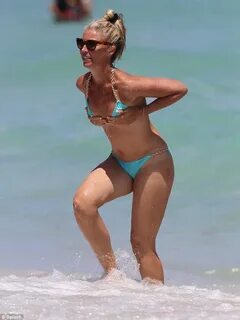 Tamara Beckwith looks fabulous on the beach... but has to ho