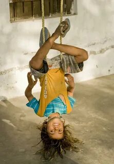 Village Boy Hanging Upside Down Photos - Free & Royalty-Free