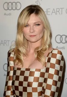 Kirsten Dunst Long Curls with Bangs - Kirsten Dunst Looks - 