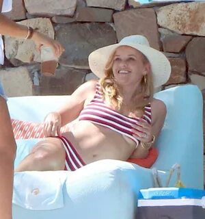 Reese Witherspoon, 42, bares her underboob in a bikini as sh