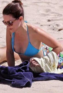Kristin Davis nipple slip on beach and upskirt paparazzi pic