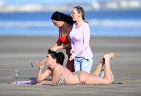 Simone Reed flashes her boobs on the beach in Benidorm, 02/12/2018. 