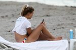 Genie Bouchard is living the good life while out sunbathing 