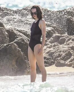 DAISY RIDLEY in Swimsuit at a Beach in Miami 01/04/2016 - Ha