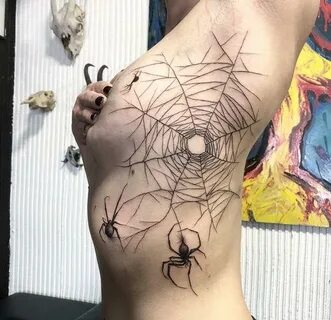 Spider web tattoo: meaning, photos and sketches on the elbow