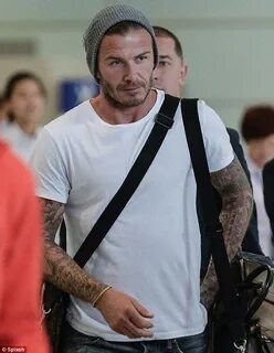 Stylish whatever he wears! David Beckham arrives in China we